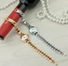Золотая серебряная мода Женские браслеты смотрят дамы рок -хрустальные часы