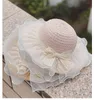 Été bébé filles casquettes de voyage enfants mignons dentelle bowknot écran solaire chapeau de paille enfants princesse Sun Shade beaux chapeaux de plage S1044