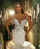 2021 Mermaid Bröllopsklänning Tiered Ruffles Långt tåg Beaded Bridal Gowns Saudiarabiska Luxury Vestido de Novia