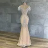 Luxury Silver Rhinestones Lång Kvällsklänning O Neck Tulle Beaded Nude Foder Mermaid Evening Gown Pageant Couture