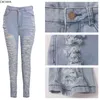 Cm.yaya denim byxor kvinnor retro solid sexig hål ihåliga ut jeans rippade flare byxor gata skinny hög midja dam byxa 211129