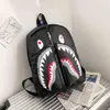 Kids Children Cartoon Shark Face School Bag Graffiti Students Backpack Tik Tok Style Book Pack Schoolbag Shoulder Bags Rucksack Sports Travel Duffle Totes G80PEWT