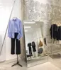 Negozio di abbigliamento Display rack Arredamento per uso professionale Pannelli da donna Acciai in acciaio inox Scatola di fondo in acciaio inox Appendiabiti Appendiabiti Appendiabiti