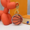 Designer Fashion KeyChain Letter Printing Round High Quality Basketball Key Chain Unisex Pu Leather Alfabet Mönster Bilnycklar Ring2050