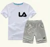 2021 Conjuntos de ropa de moda de verano Niños Diseñador Ropa de manga corta delgada Pantalones cortos Niños Niñas Imprimir 2-7 años Bebé