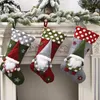 フィジットのおもちゃクリスマスの家の装飾ペンダントの靴下ぬいぐるみかわいいサンタクロースぬいぐるみ柔らかいピンクのお祝い雰囲気子供のギフトを開く驚きの卸売卸売