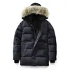 Piumini da uomo Canadese Parka Invernale in tessuto impermeabile Uomo Pelliccia di lupo Wyndham Giacca con cappuccio Fourrure Capispalla Pelliccia di procione Cappotto caldo28x8