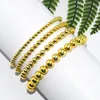 Perlen-Stränge Armband vielseitig runder Wulst vergoldeter Strandstil Geometrische elastische Farbbehandlung