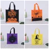 50pcs / lot Halloween Candy Sac Gift Wraps Reutilisable Eco Friendly Shopping Sacs Kindergarten Party Fabrication non tissée Tissu ou Treat de sac à main pliable Th0090