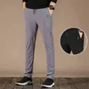 Czarne spodnie sportowe Mężczyźni Letnie Oddychające Szybkie Suche Casual Zipper Kieszonkowy Spodnie dresowe Mężczyźni Marka Moda Luźne męskie Spodnie 211201