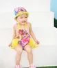 Bebê menina maiô de uma peça vívido florido designer suspender beachwear 1-4t crianças maiô com touca de natação bonito