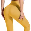 最高品質の高い腰の女性のレギンスアイレットの完璧なニットタイツシームレスなヨガパンティーTummy Controlフィットネスジムスポーツパンツ