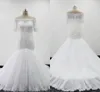 2021真珠プラスサイズのウェディングドレスマーメイド肩の長い列車からの花嫁の女性のためのハーフスリーブレースアップリケトランペットブライダルドレス