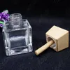 2021 50 ml 50g de vidro fragrância vidro difusor frascos quadrados forma com tampa de madeira limpar perfume óleo essencial Difusor de óleo Refresco de ar