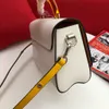 New Arrivals high quality Twist mid-size handbag Shoulder Bags Glass handle and colorful brand pendant Removable leather strap size23*17*9.5cm