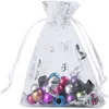 100 stks / partij organza tassen met trekkoord voor ringen oorbellen tas bruiloft baby shower verjaardag kerstcadeau pakket