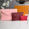 Women Classic Pochette Kirigami Clutch Bag 3 separate envelope-style holding bags that overlap each other