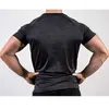 Mężczyzna Jogger Workout Tee Topy Krótki Rękaw Szybka Sucha Koszulka Solidna Mężczyźni Siłownie Fitness Bodybuilding Skinny T-Shirts