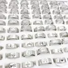 En gros 100 PCs / Lot Hommes Femmes En Acier Inoxydable Bande Anneaux Laser Cut Patterns Poli Bijoux De Mode Anneau Party Favor