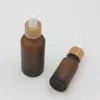 Frostat Amber White Glass Dropperflaska 15ml 30ml 50ml med bambu keps 1oz Trä Essential Oil Bottles