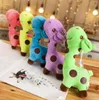 Cartoon giraffe plush toy doll large factory direct children's day birthday gift folder machine dolls