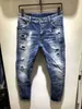 Mode rippad italiensk stil jeans män patchwork ihålig ut tryckta tiggare beskurna byxor man cowboys demin byxor man 210622