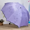 Ladies'sunshine fleurs dans l'eau change de couleur parasol parapluie triple pli caoutchouc noir UV femme parapluies