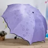 Ladies'sunshine blossoms in water changes color parasol umbrella triple fold black rubber UV woman umbrellas