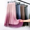 Qooth Summer Trendy Women Skirts All-match Gradient Color Shiny Tulle Pleated Tutu Midi With Lining QT018 210609