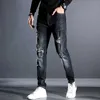 Moda masculina de primavera rasgado jeans patch marca marca jeans calças clássicas tendência macho mestrado pés casuais calças pretas casuais 210531