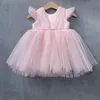 ほこりのピンクのリトルガールズポージェントのドレスボールガウンフリルの花の誕生日パーティーの服用赤ちゃん弓鍵穴バック茶長キッズフォーマルウェア