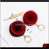 Keychains mode Aessory Fluffy Pompom Keychain Rose Flower Women Bag Charm Real Natural Fur Balls äkta Pom Poms Key Chain Drop Deliver