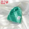 Bonnet en fil torsadé japonais de couleur unie Bonnets tricotés chauds pour la protection des oreilles des étudiants et casquettes froides polyvalentes pour les couples