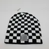 Svart checkerboard kvinnor beanie par gata dans hip hop check leopard tryck kall hatt män damer trendig varm ullhatt