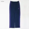 Pantaloni da uomo AWGE Needles Pantaloni della tuta Uomo Donna Pantaloni da jogging Pantaloni a righe con ricamo a farfalla con coulisse