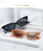 2021 Cat-Eye European и American Trend Trend цепочка окраски солнцезащитные очки женщины