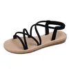 Frauen Sandalen Knöchel Gummiband Kreuzgebundene aushöhlen flache 2021 Sommer Strandmode Lässige römische Gladiator Damen schwarze Schuhe Y0721