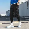 Streetwear 2021 mode hommes Joggers Hip Hop sarouel rubans fermeture éclair pantalon décontracté hommes Cargo pantalon Y0927