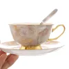 Tazze Piattini Colazione di lusso Tazza da caffè e piattino Set Bone China Oro Tazza da ufficio europea con cucchiaio Espresso in ceramica