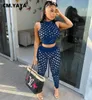 CM.YAYA Frauen Sets Solide Loch Durchsichtige Ärmellose Oansatz Crop Tops Mantel Elastische Lange Bleistift Hosen 2 Stück Set Sommer 2021 Y0625