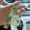 Luminescent Floating Cat Keychain Light acrylique chaton liquide Keychains Couple Jewelry Cadeau de Noël mignon Chèfle Key Chains G18560776