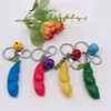 Z Bell Groch Per Toys SqueezeAbean Key Ring Portfel Portfer Zakroda Pendanty Sensory Squeeze Peas Tiktok Squeeze Toy Finge8815349