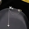 Düzensiz dişi küpe yıldızları bir zincir kulak takı tek pirinç kemik klipsli saplama