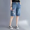 女性の夏の民謡風の弾性腰の花の刺繍巾着リッピングショートパンツ女性オフィスレディカジュアルルースデニムショート210714