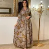 Sukienki swobodne modne francuskie eleganckie dla kobiet lato retro druk muzułmański Dubai Abaya Lapel z pojedynczą koszulą Długie rękawie sukienka