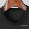 Luxury-Famous Mens Högkvalitativ T-shirt Brev Skriv ut Rund hals Kortärmad Svart Vit Mode Män Kvinnor Högkvalitativa Tees