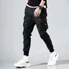 Hip Hop Joggers Męskie Czarne Spodnie Harem Multi Pocket Wstążki Męskie Spodnie Sportowe Streetwear Cargo Spodnie Mężczyźni Japońska Streetwear 211008