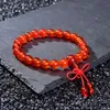 Bracelet de perles rouges de cornaline de pierres précieuses naturelles de taille 8 mm avec bracelet tissé digne de nœud chinois.
