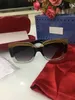 0083S Gafas de sol con lentes grises cuadradas de gran tamaño en negro, gafas de sol de diseño con protección UV 0083 Gafas de sol cuadradas para mujer de 55 mm Fabricadas en Italia - Viene con su caja original