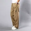 Homens Casual Calças Outono Plus Size em linha reta Plus Size 5XL Bolso Lado Tático Algodão de Algodão Algodão Macacão Preto Homens Carga Calças G0104